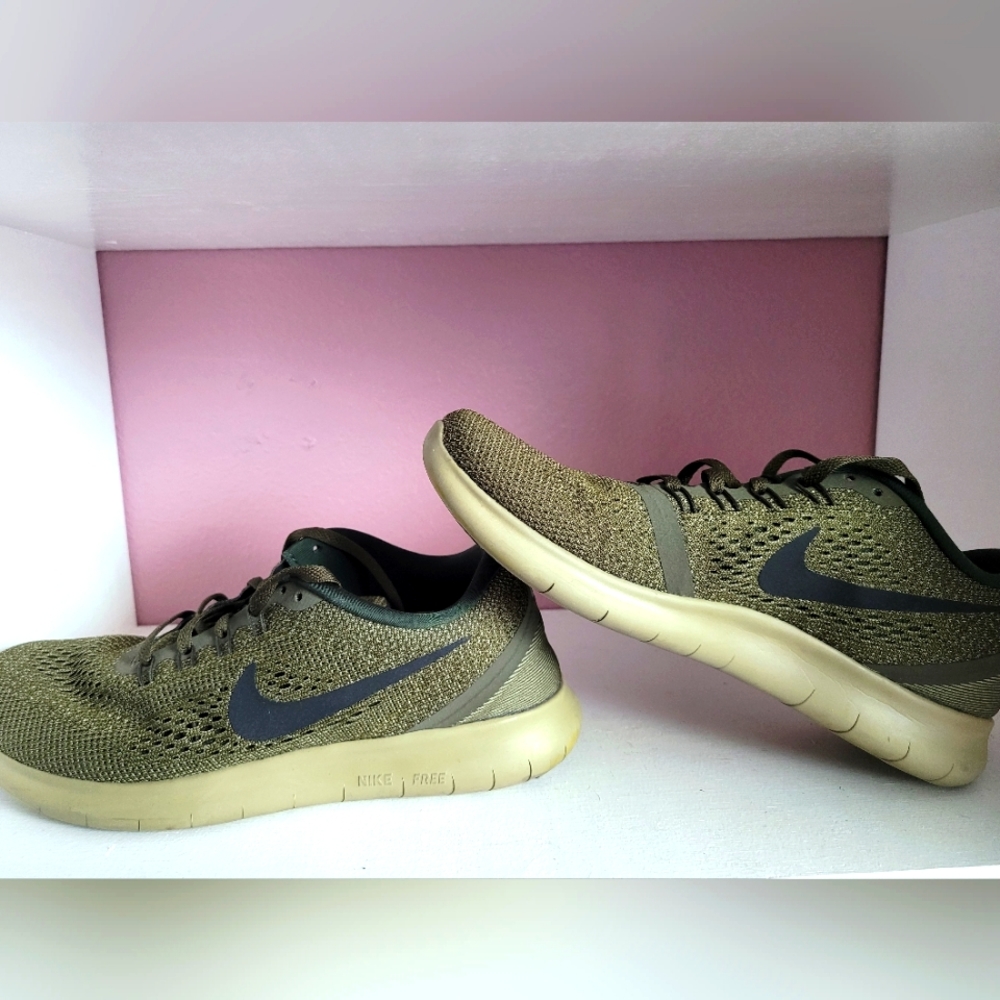 Nike Free size 9 women dark green like new.